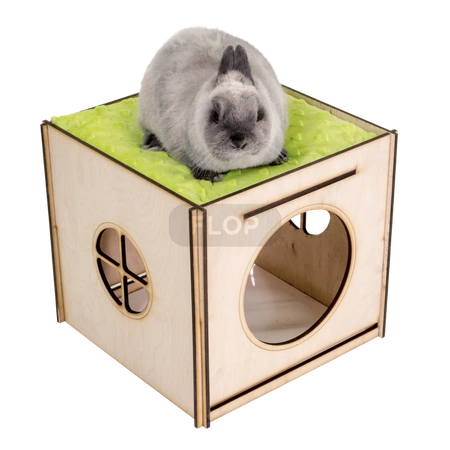 Großes Haus mit Dach, Hängematte und Kissen für Kaninchen - Blätter auf schwarzem Hintergrund