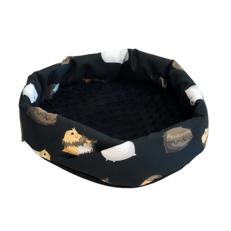 Schwarzes rundes Kuschelbett mit Meerschweinchenmotiv für Kleintiere 